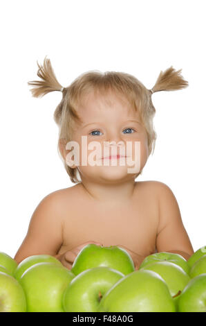 Petite fille heureuse avec la pomme verte Banque D'Images