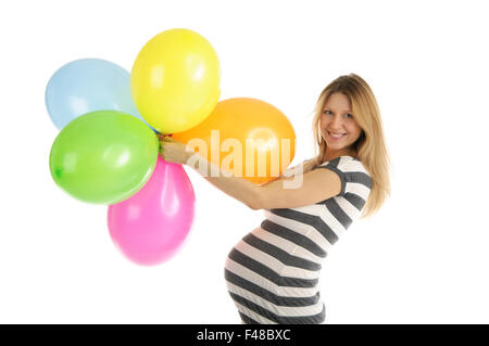 Femme enceinte avec des ballons Banque D'Images