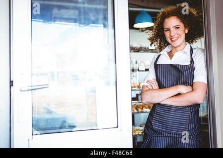 Barista Pretty smiling at the camera Banque D'Images