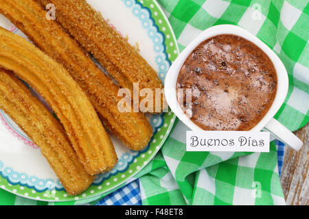 Buenos dias (qui signifie bonjour en espagnol) carte avec des churros Espagnol Banque D'Images