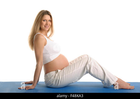 Pregnant woman sitting Banque D'Images