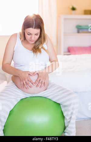 Femme enceinte garder la forme Banque D'Images