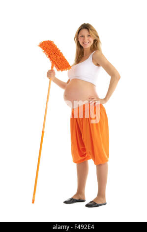 Happy pregnant woman with a mop Banque D'Images
