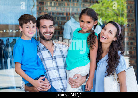 Happy Family having fun in the mall Banque D'Images