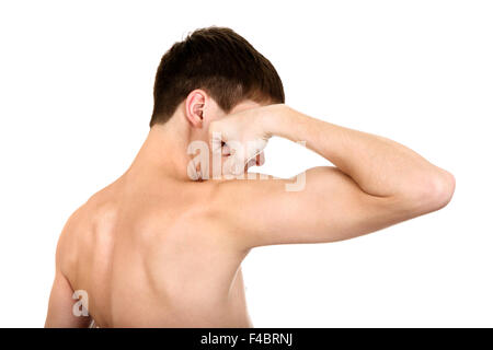 Young Man flexing Muscles Banque D'Images