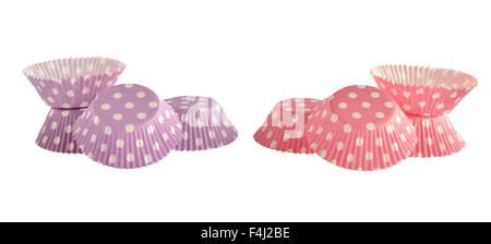 Rose et violet cuisson papier à muffins avec des points blancs Banque D'Images