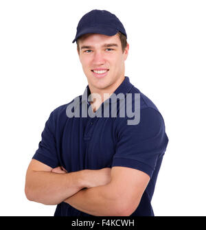 Portrait of handsome young workman with arms folded Banque D'Images