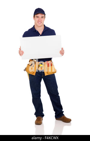 Portrait of happy réparateur holding white board Banque D'Images