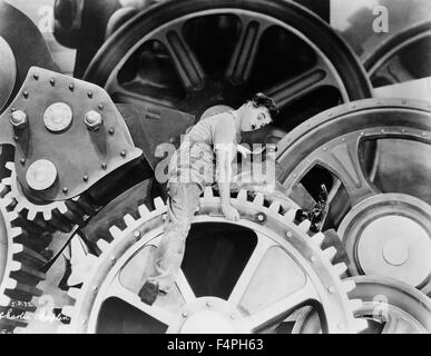 Charles Chaplin, sur-ensemble du film "Les temps modernes", 1936 Banque D'Images