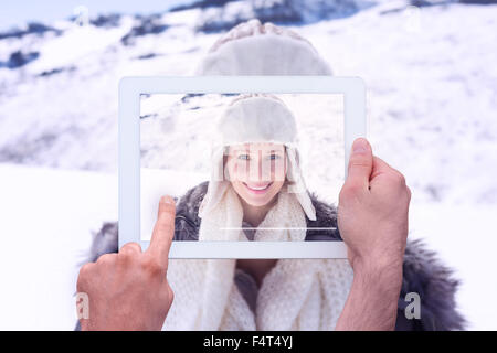Image composite de hand holding tablet pc Banque D'Images