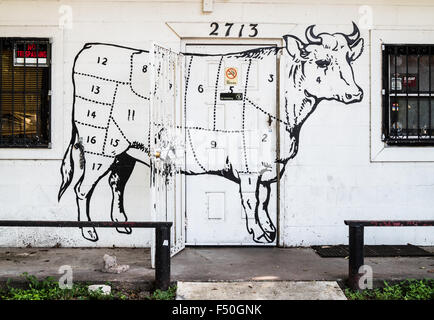 Une grande fresque de coupes de boeuf sur le mur d'une commune barbecue à Austin, Texas Banque D'Images