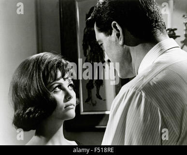 Les acteurs Rock Hudson et Claudia Cardinale dans une scène du film 'Bandeau', USA 1966 Banque D'Images