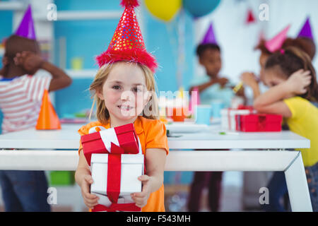 Smiling girl at Birthday party Banque D'Images