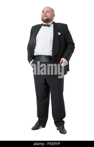 Jolly Fat Man in Tuxedo and Bow tie montre des émotions, sur fond blanc Banque D'Images