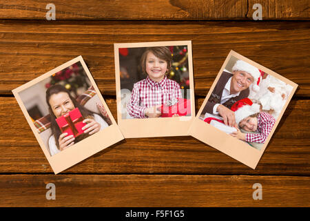 Image composite de instant photos sur plancher en bois Banque D'Images