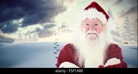 Image composite de santa smiles with folded arms Banque D'Images