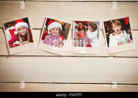 Image composite de instant photos sur plancher en bois Banque D'Images