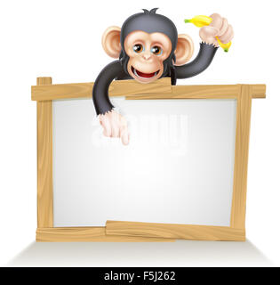 Cartoon singe chimpanzé comme mascotte de caractères au-dessus d'un signe vierge tenant une banane Banque D'Images