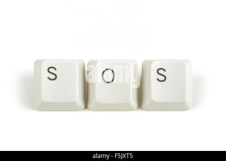 SOS texte par la diffusion des touches du clavier isolé sur fond blanc Banque D'Images