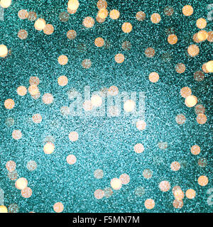 Fond bleu avec des lumières brillantes d'or. Abstract texture fêtes Banque D'Images