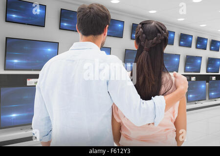 Composite image of young couple et à la recherche Banque D'Images