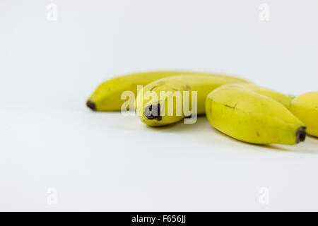 Trois bananes, isolé sur fond blanc Banque D'Images