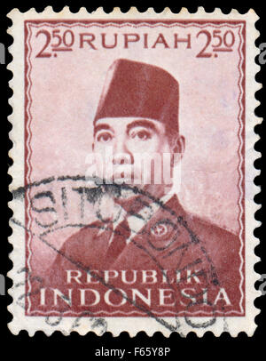 Indonésie - VERS 1953 : timbres en l'Indonésie présente le premier président indonésien Sukarno, vers 1953 Banque D'Images