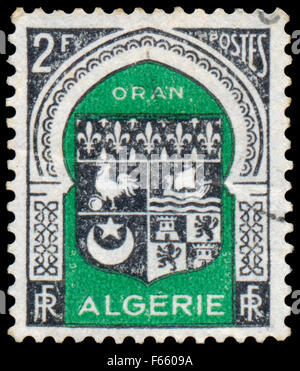 Algérie - circa 1947 : timbre imprimé en Algérie à partir de la question des armes diverses armes d'Alger montre, vers 1947 Banque D'Images