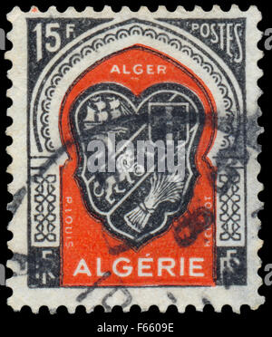 Algérie - circa 1947 : timbre imprimé en Algérie à partir de la question des armes diverses armes d'Alger montre, vers 1947 Banque D'Images