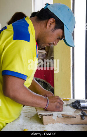 Jose Moquinche des trous dans le teint et tagua en forme Banque D'Images