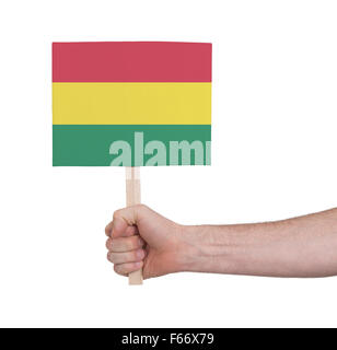 Main tenant petite carte, isolé sur blanc - Drapeau de la bolivie Banque D'Images