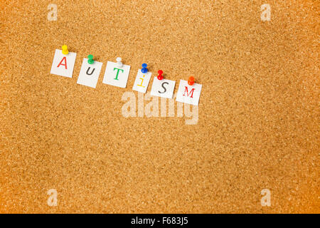 L'Autisme coincé sur le panneau de liège Banque D'Images