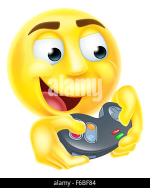 Un joueur de smiley emoticon emoji cartoon character holding un contrôleur de jeux vidéo Jeux Banque D'Images