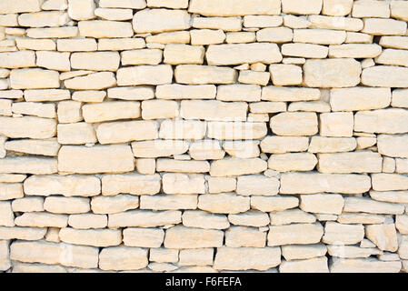 Mur de pierre fond, modèle, texture, papier peint. Construction Extérieur en Provence, Cote Azur, France, Europe. Banque D'Images