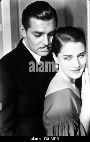 1932, le titre du film : ÉTRANGE INTERLUDE, Directeur : ROBERT Z LEONARD, Studio : MGM, Photo : Clark Gable, Norma Shearer, caresser, acculé, homme embrassant de derrière, LES YEUX GLAZY, LES FEMMES (facile), le flirt, les hommes (avant), les hommes (prédateurs). (Crédit Image : SNAP) Banque D'Images