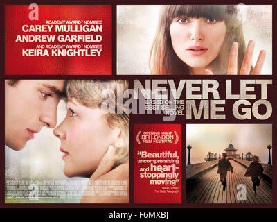 DATE DE SORTIE : 25 novembre 2010. Titre du film : ne jamais me laisser aller. STUDIO : Fox Searchlight Pictures. Résumé : En tant qu'enfants, Ruth, Kathy et Tommy, passent leur enfance dans un pensionnat anglais idyllique en apparence. Lorsqu'ils seront de jeunes adultes, ils trouvent qu'ils ont à composer avec la force de l'amour qu'ils se sentent l'un pour l'autre, tout en se préparant pour la réalité obsédante qui les attend. Photo : Poster. Banque D'Images