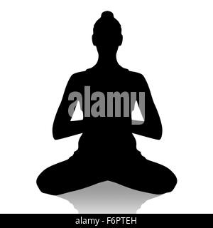 Silhouette of woman in yoga position Banque D'Images