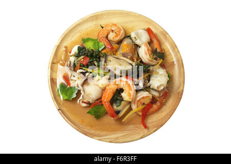 Sauté de fruits de mer épicés avec des herbes, la nourriture thaïe Banque D'Images