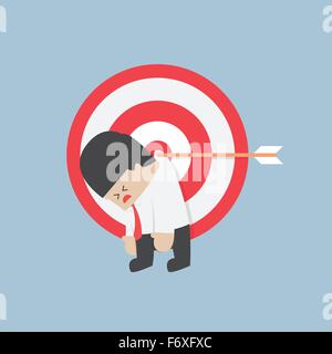 Businessman hanging sur la cible, le vecteur, EPS10 Illustration de Vecteur