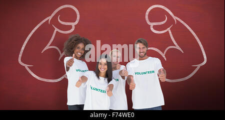 Libre de groupe de volontaires giving Thumbs up Banque D'Images