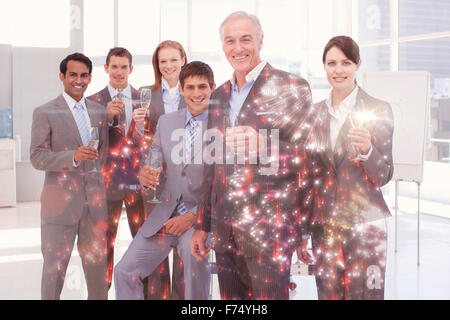 Image composite des gens d'affaires toasting with champagne Banque D'Images