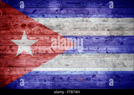 Une vignetted image de fond du drapeau de Cuba peints sur des planches de bois d'un mur ou le plancher. Banque D'Images