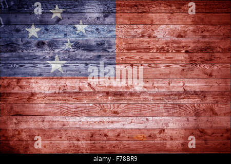 Une vignetted image de fond du drapeau de Samoa sur les planches de bois d'un mur ou le plancher. Banque D'Images