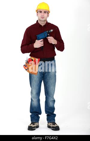 Man holding power-drill Banque D'Images