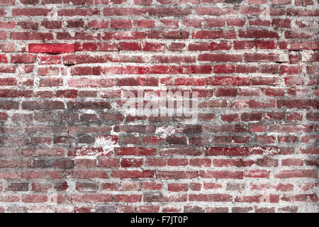 Détails de la surface d'un vieux mur en pierres rouge et gris. Banque D'Images