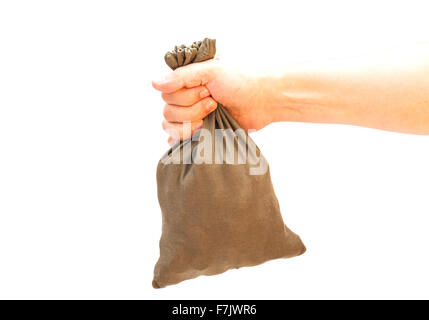 La main de l'homme avec de la toile de jute sac sur fond blanc Banque D'Images