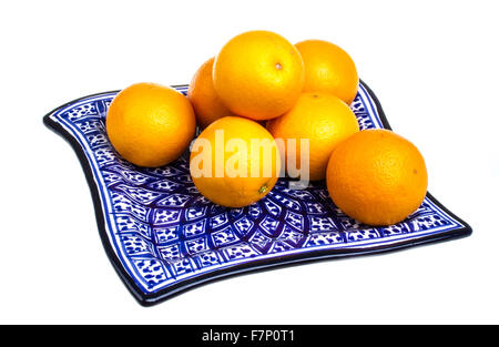 Tas d'oranges dans le plat Banque D'Images