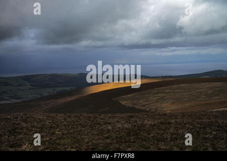 Vue depuis le haut de Dunkery Beacon, le plus haut point d'Exmoor, sur la Holnicote Estate, Parc National d'Exmoor, Somerset. Banque D'Images