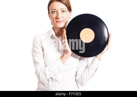 Femme tenant un disque vinyle isolated on white Banque D'Images