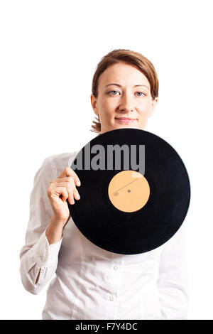 Femme tenant un disque vinyle isolated on white Banque D'Images